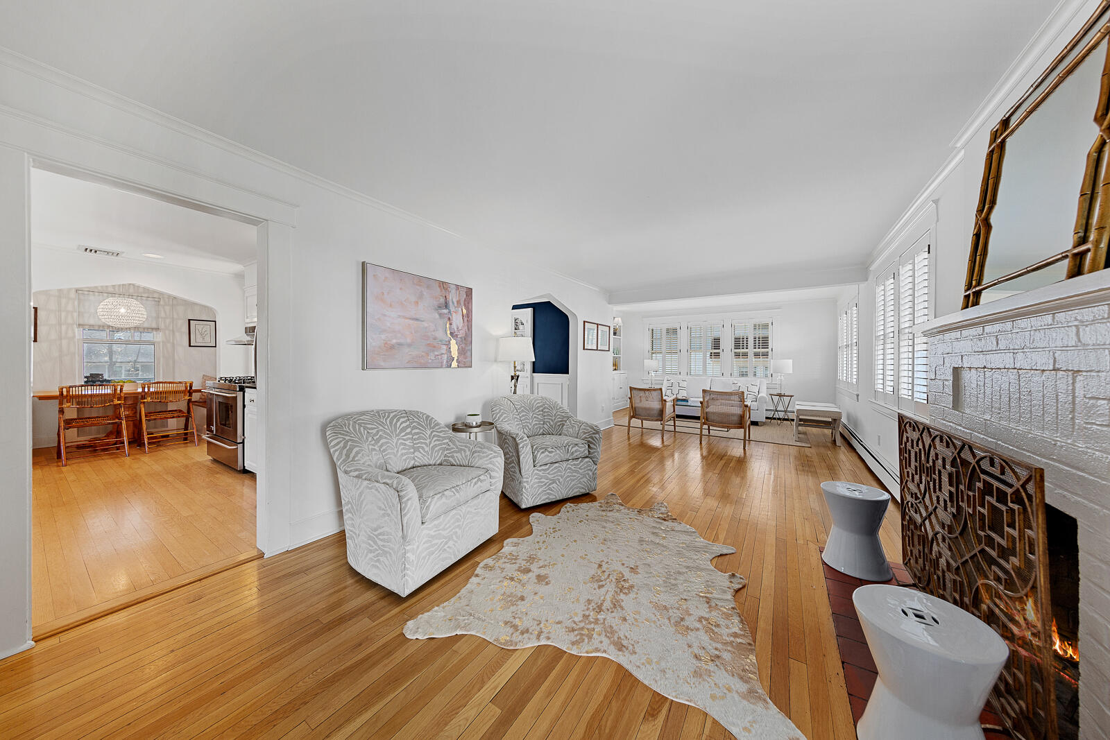 70 Middlesex Road Darien, CT 06820 - Photo 6 of 36 a living room with fireplace furniture and a wooden floor