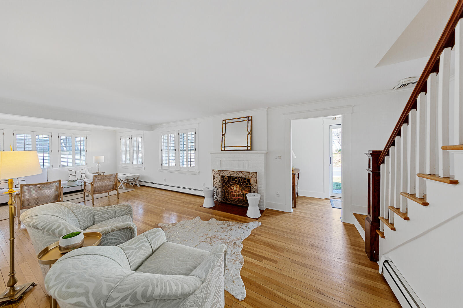 70 Middlesex Road Darien, CT 06820 - Photo 7 of 36 a living room with furniture and a fireplace