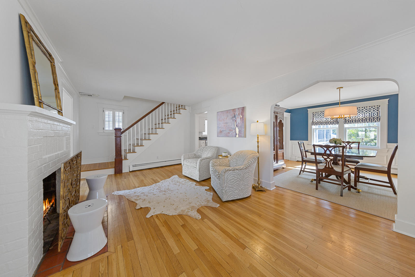 70 Middlesex Road Darien, CT 06820 - Photo 10 of 36 a bed room with furniture and a fireplace