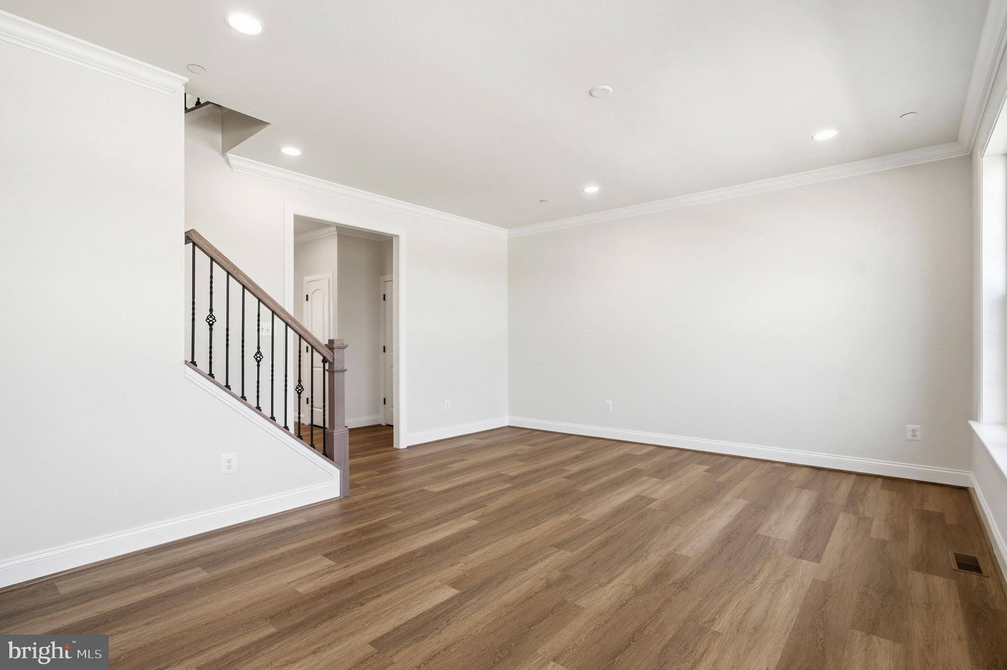 106 Potomac Court Prince Frederick, MD 20678 - Photo 19 of 47 a view of a hallway with wooden floor