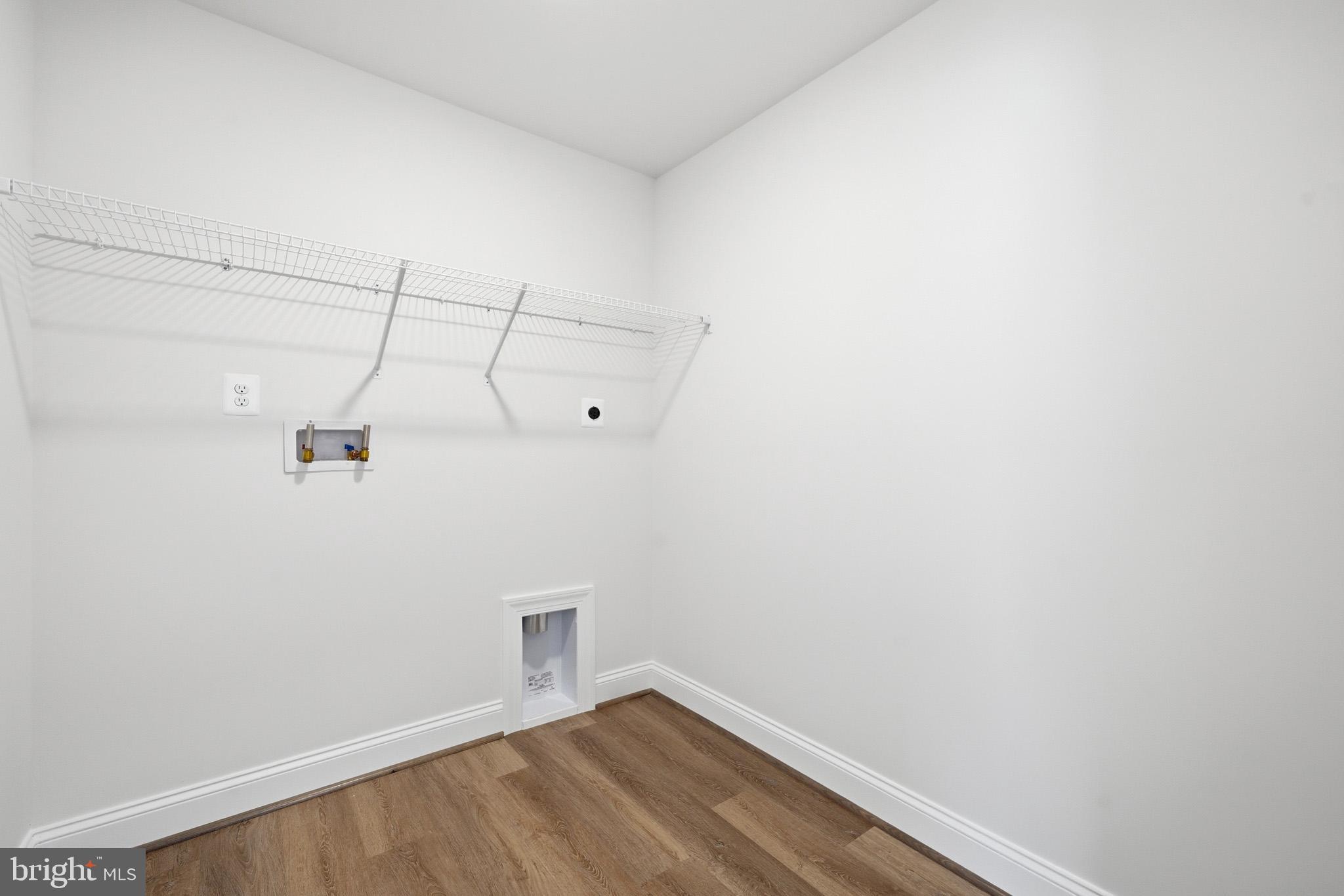 106 Potomac Court Prince Frederick, MD 20678 - Photo 31 of 47 a view of a room with racks on the wall