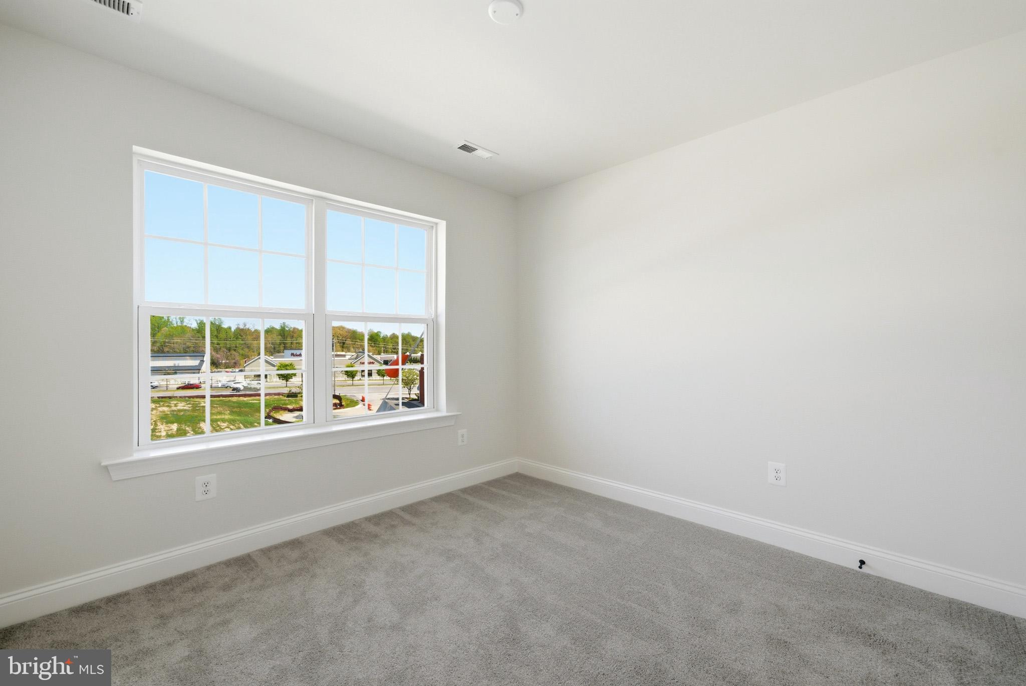106 Potomac Court Prince Frederick, MD 20678 - Photo 35 of 47 an empty room with a window