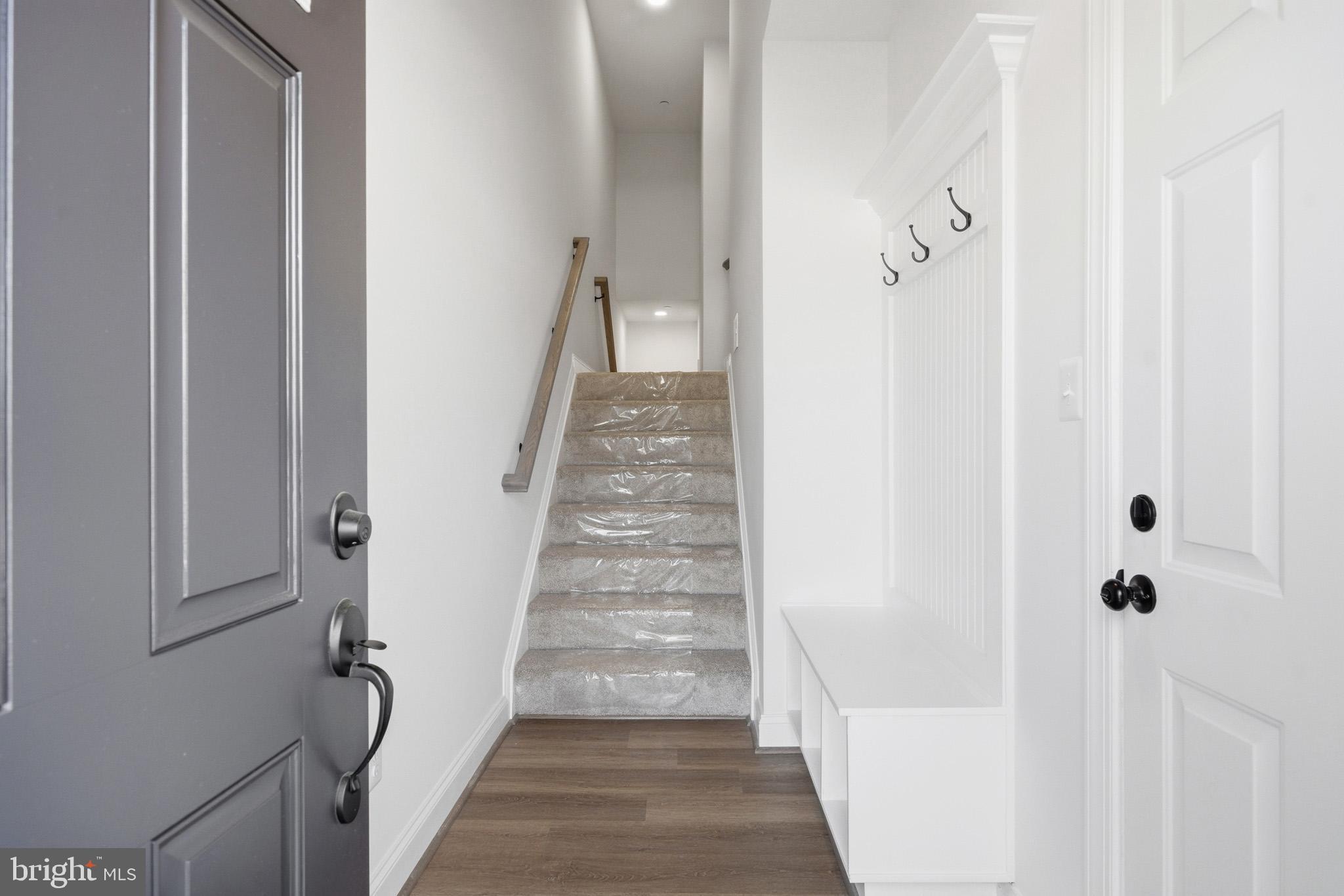 106 Potomac Court Prince Frederick, MD 20678 - Photo 4 of 47 a view of a hallway with of the door