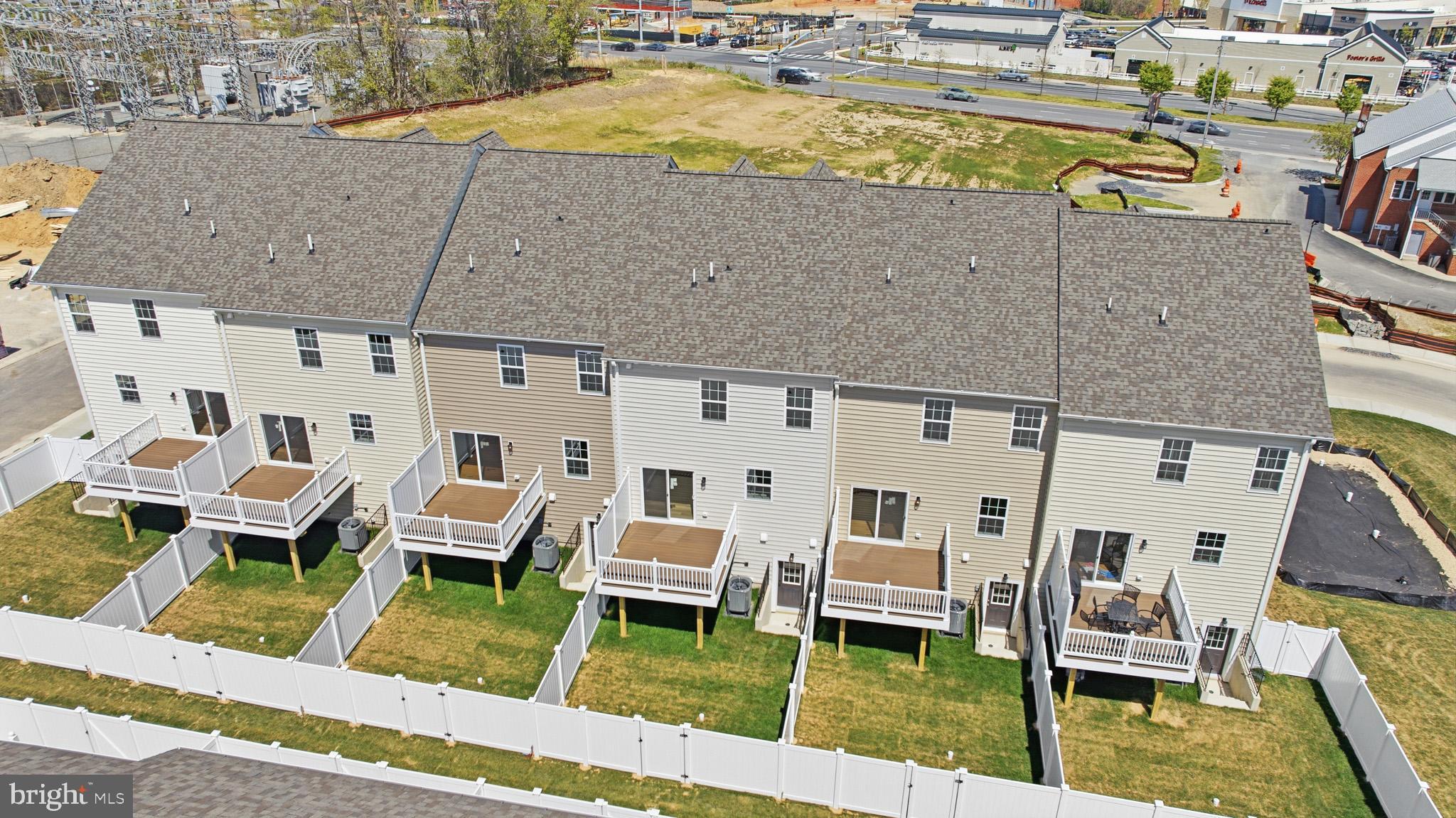 106 Potomac Court Prince Frederick, MD 20678 - Photo 47 of 47 a balcony with table and chairs