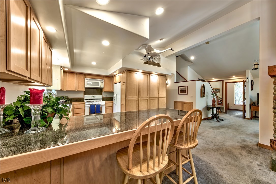 146 Tramway Road Incline Village, NV 89451 - Photo 15 of 34 a dining room with furniture and chandelier