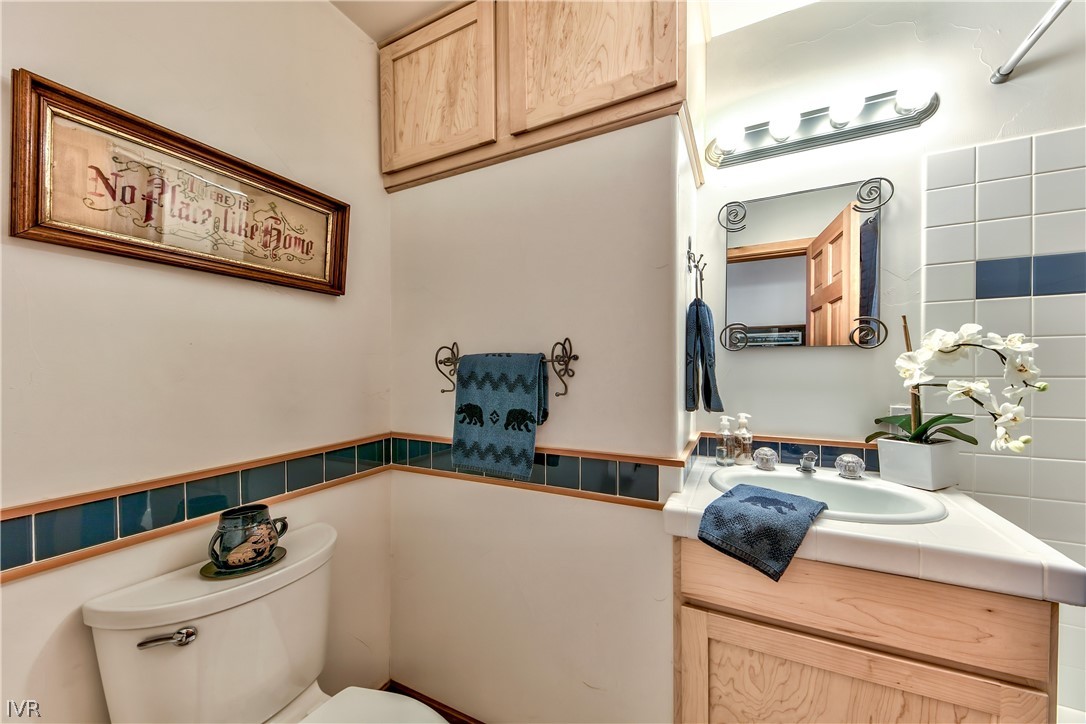 146 Tramway Road Incline Village, NV 89451 - Photo 19 of 34 a bathroom with a sink and a mirror