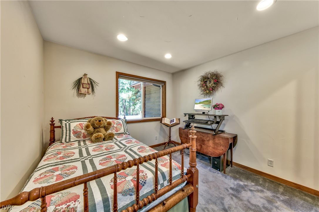 146 Tramway Road Incline Village, NV 89451 - Photo 22 of 34 a bedroom with furniture and a window
