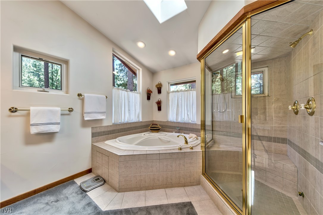 146 Tramway Road Incline Village, NV 89451 - Photo 29 of 34 a bathroom with a bathtub and a shower