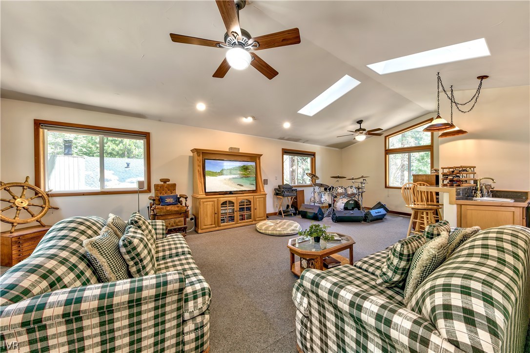 146 Tramway Road Incline Village, NV 89451 - Photo 30 of 34 a living room with furniture fireplace and a large window