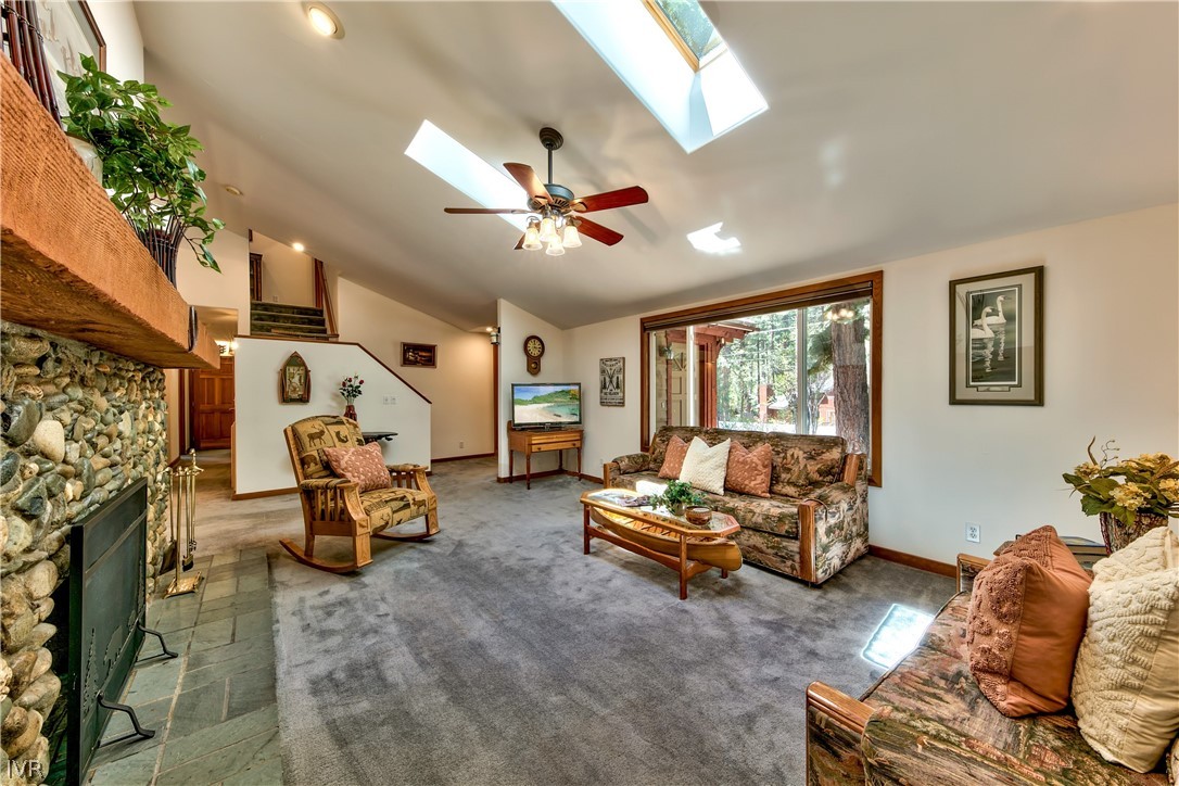 146 Tramway Road Incline Village, NV 89451 - Photo 9 of 34 a living room with furniture chess table and a fireplace
