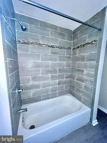 a bathroom with a bathtub