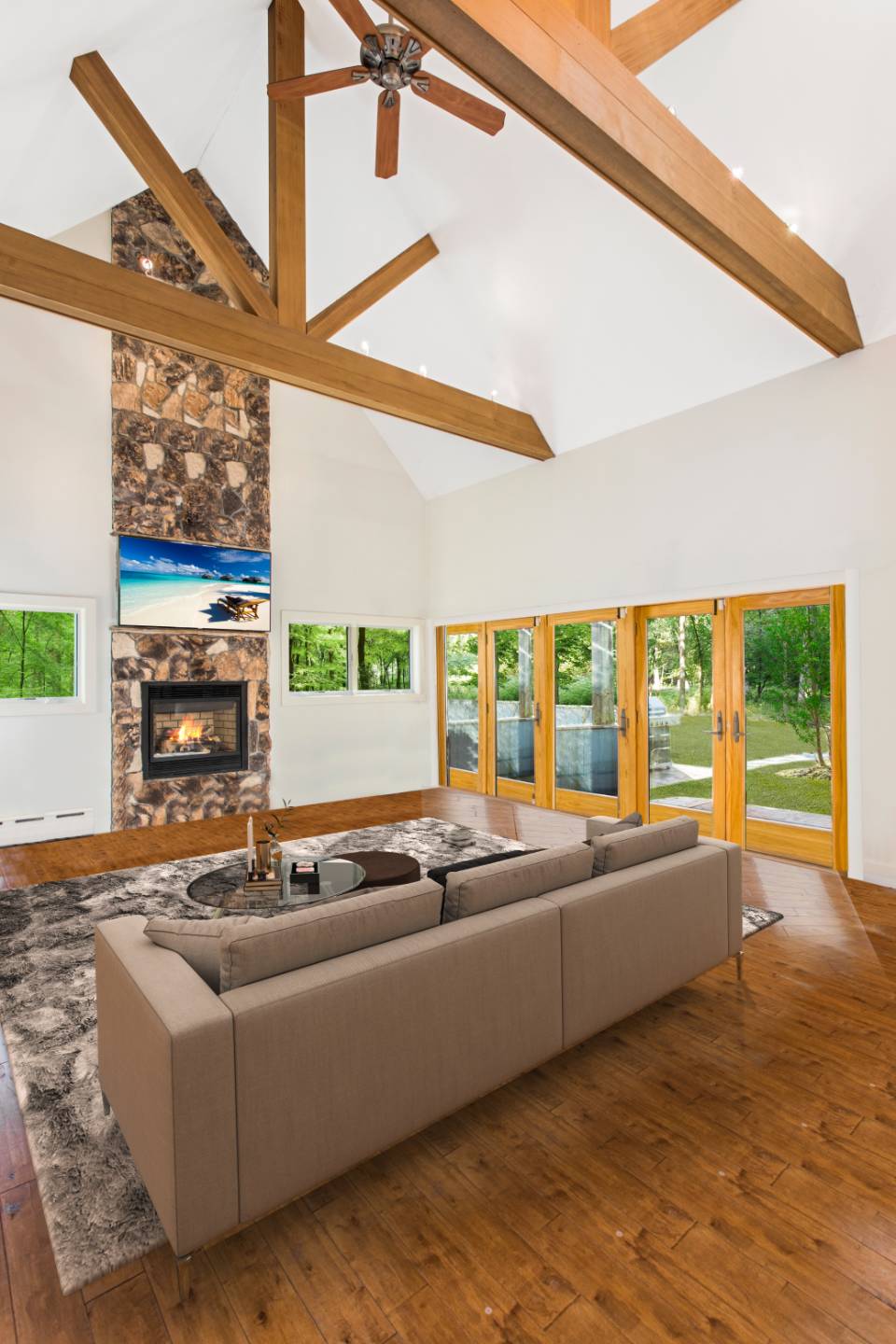 1095 Millstone Road Sag Harbor, NY 11963 - Photo 7 of 19 a living room with furniture and a large window