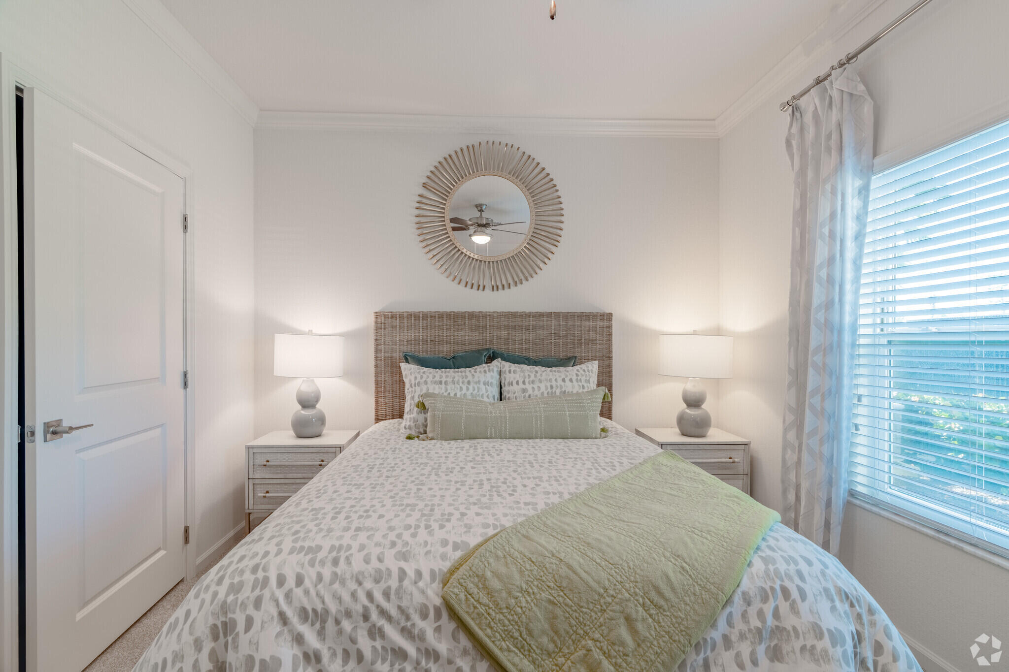 1924 Northwest Federal Highway, Unit 3418 Stuart, FL 34994 - Photo 11 of 18 a bedroom with a bed and a window