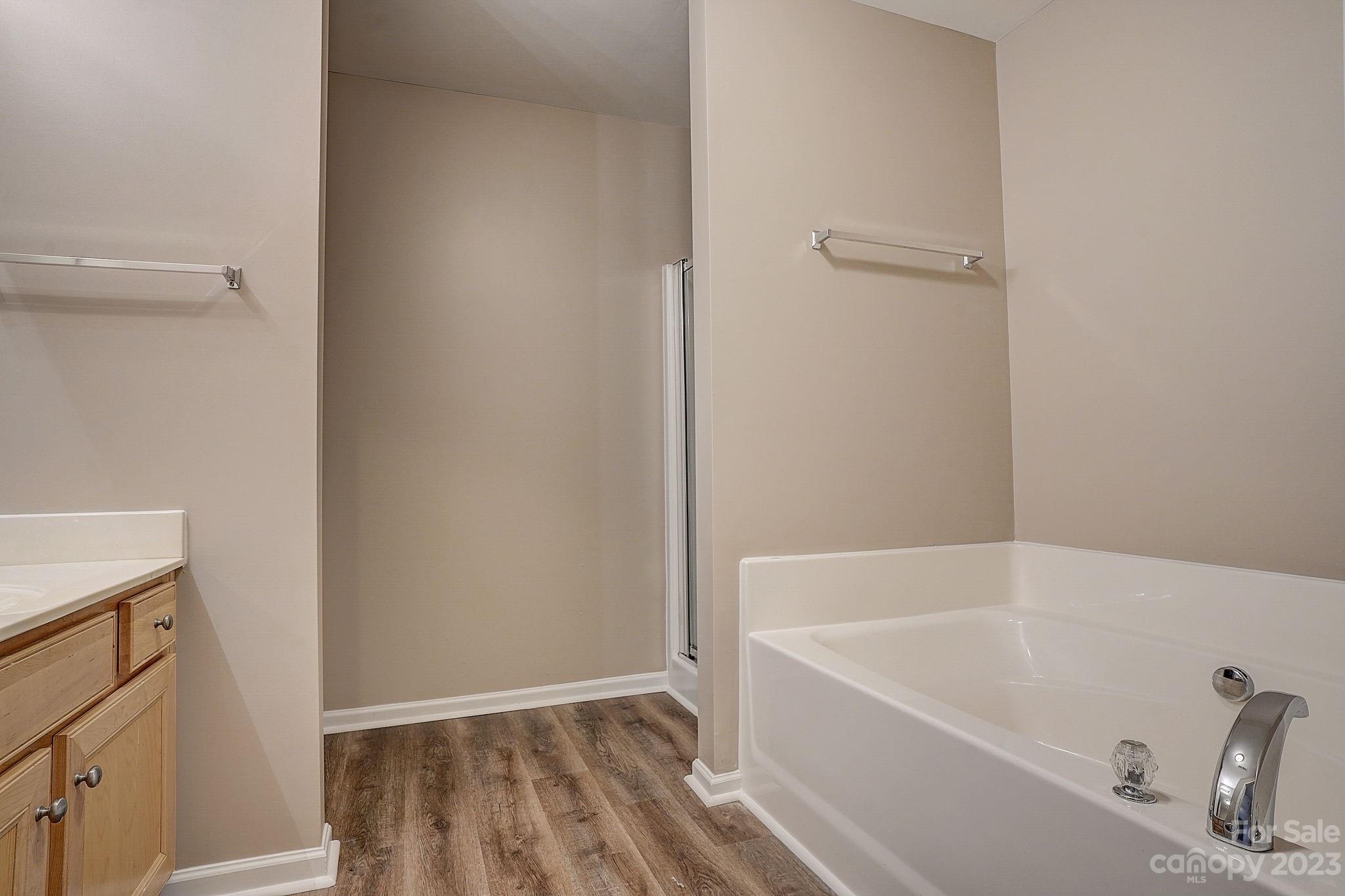 2119 Midnight Blue Lane Fort Mill, SC 29708 - Photo 13 of 15 a bathroom with a bathtub