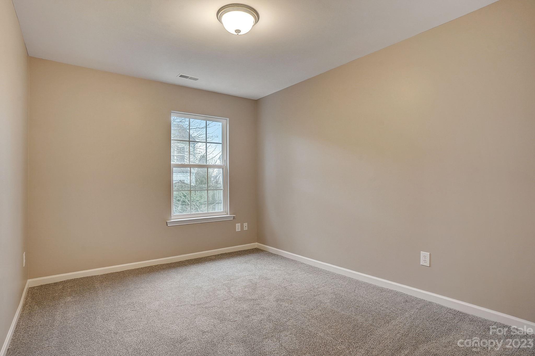 2119 Midnight Blue Lane Fort Mill, SC 29708 - Photo 7 of 15 an empty room with a window