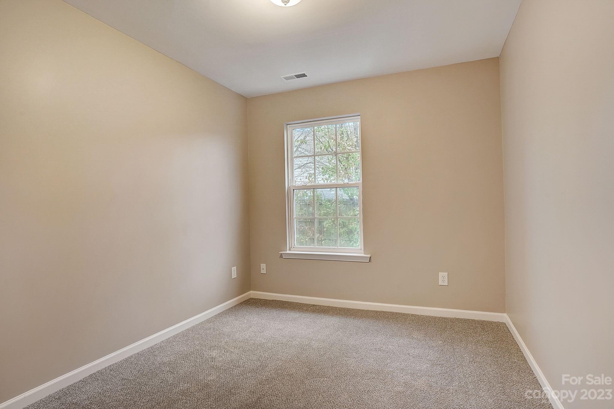 2119 Midnight Blue Lane Fort Mill, SC 29708 - Photo 8 of 15 an empty room with a window