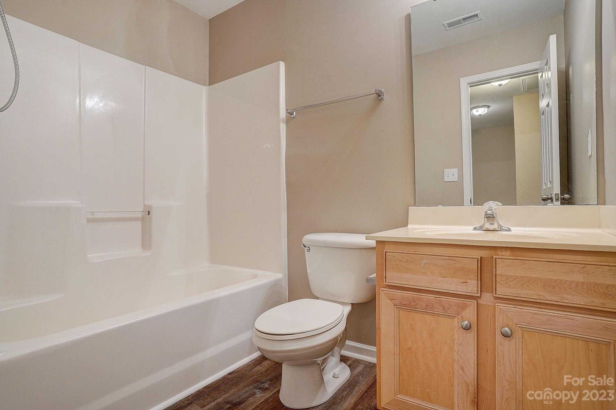 2119 Midnight Blue Lane Fort Mill, SC 29708 - Photo 9 of 15 a bathroom with a sink toilet and shower