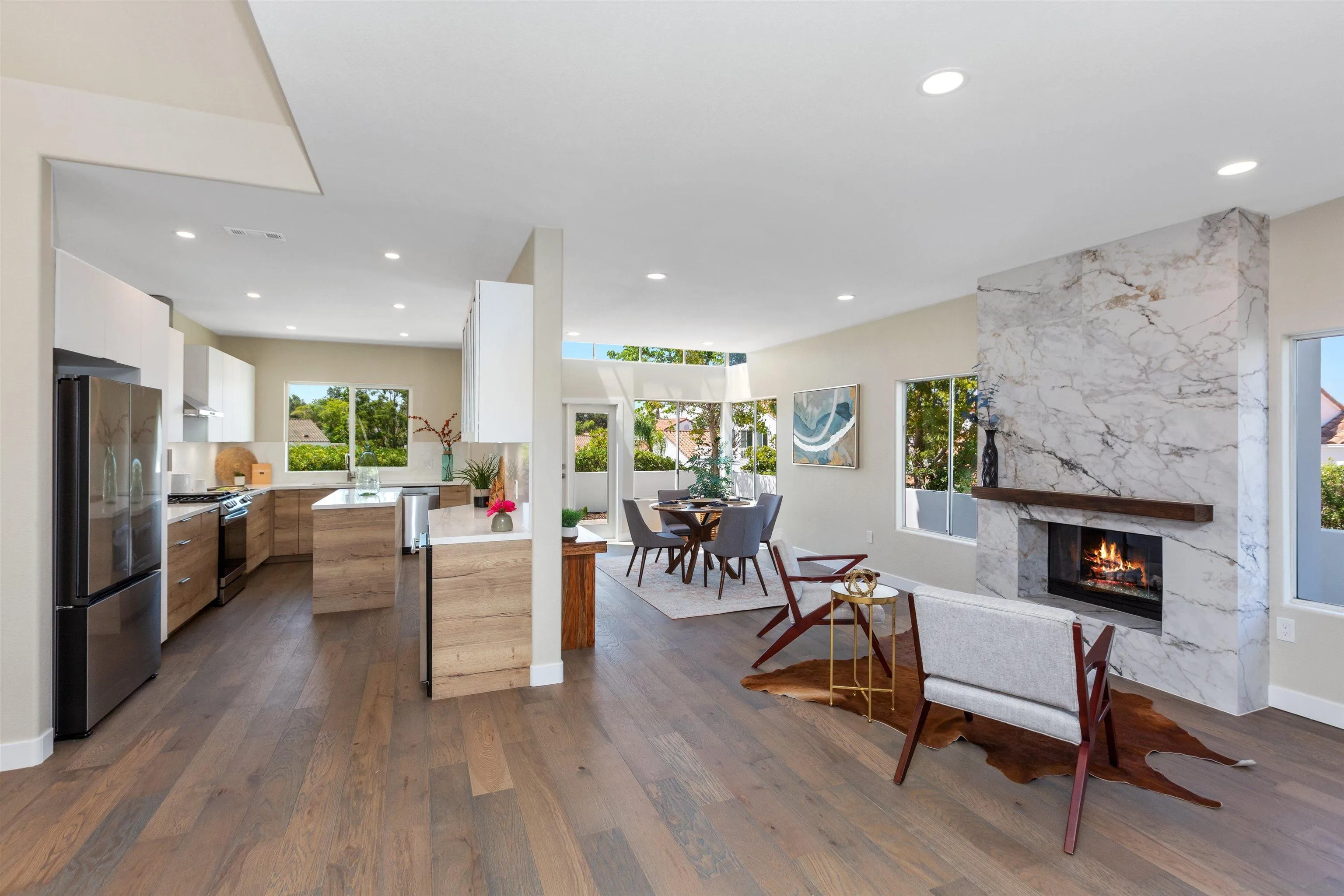 4963 Pylos Way Oceanside, CA 92056 - Photo 13 of 53 a living room with furniture and a fireplace