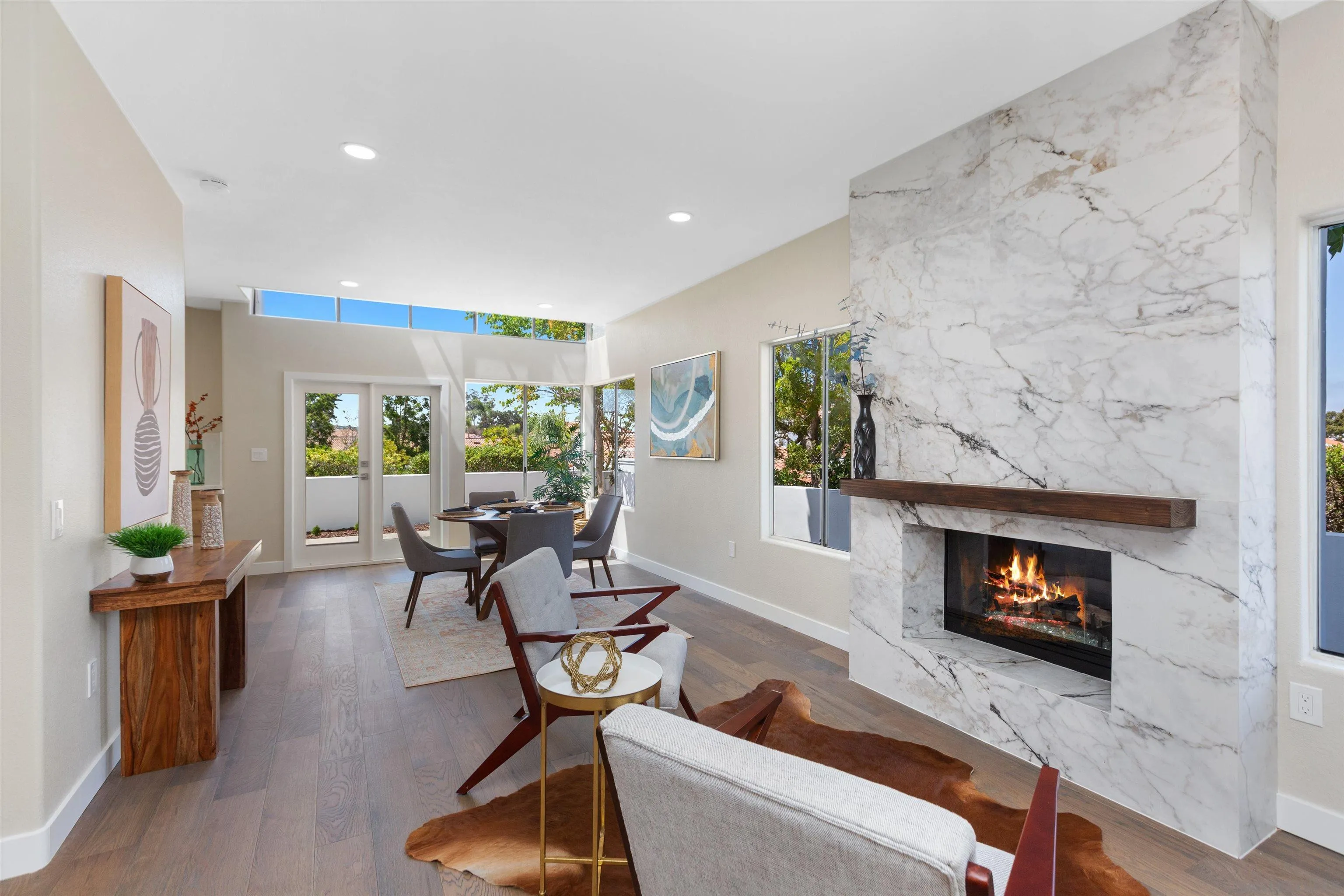 4963 Pylos Way Oceanside, CA 92056 - Photo 14 of 53 a living room with furniture and a fireplace