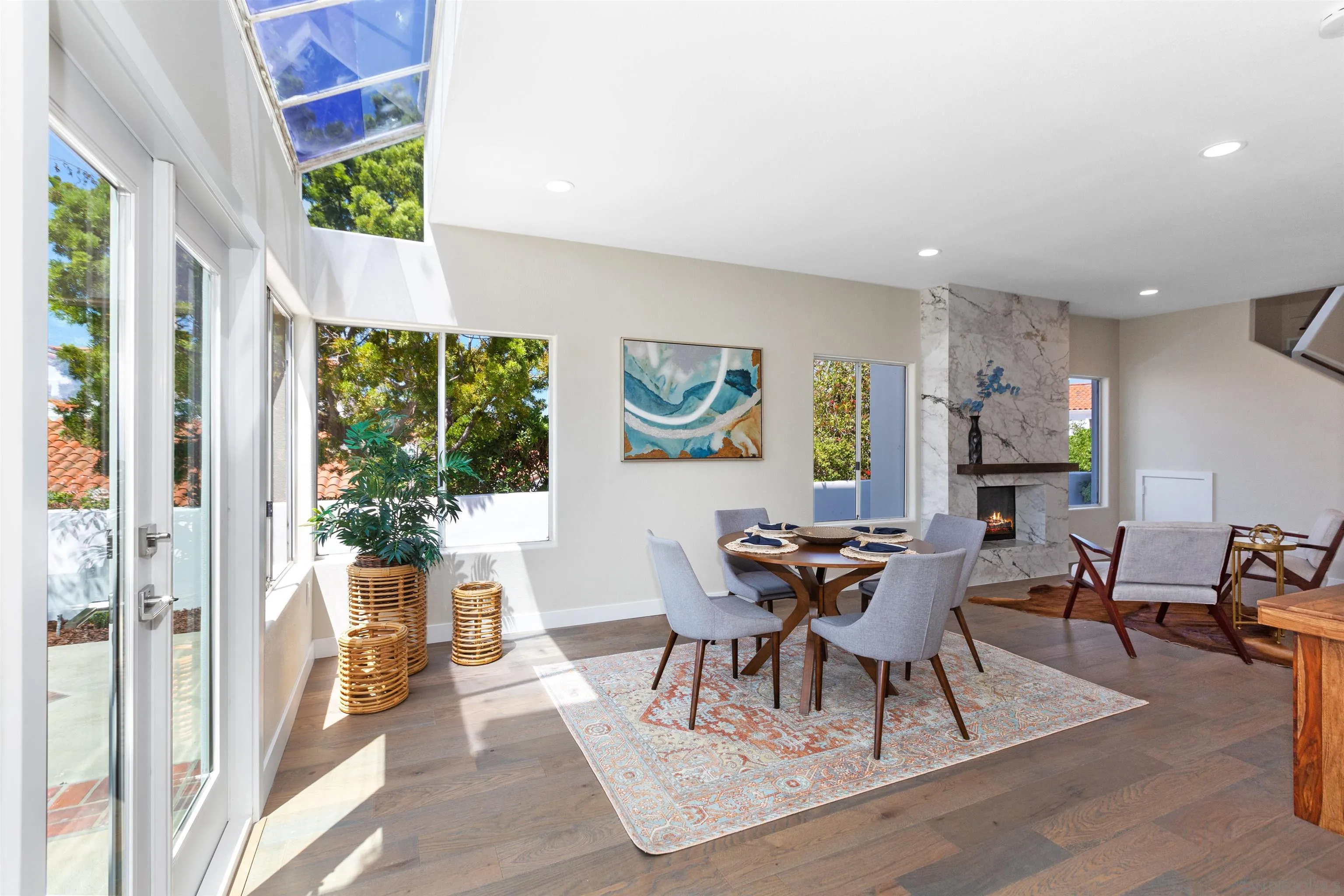 4963 Pylos Way Oceanside, CA 92056 - Photo 20 of 53 a dining room with furniture and wooden floor