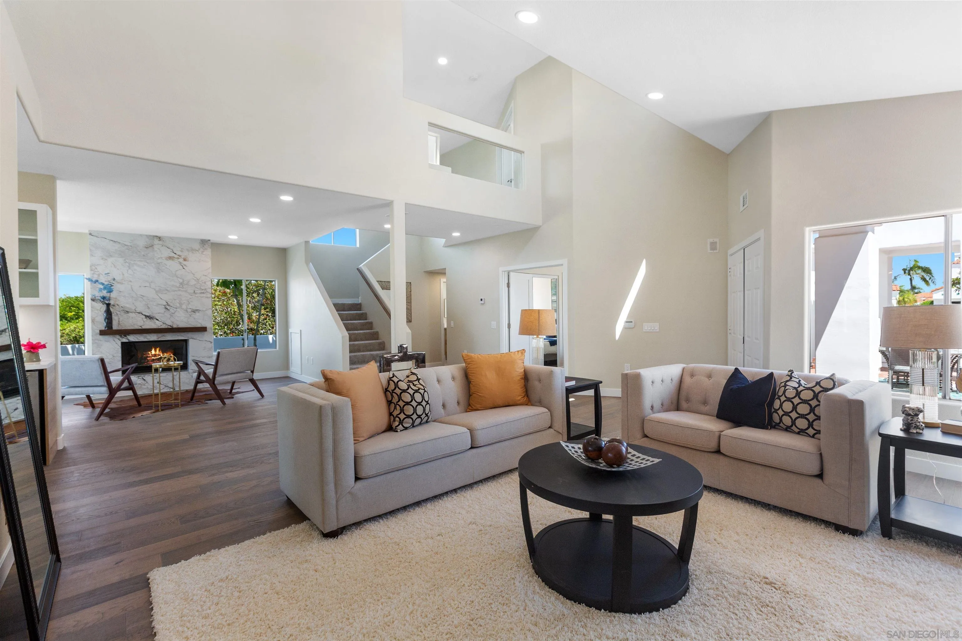 4963 Pylos Way Oceanside, CA 92056 - Photo 23 of 53 a living room with furniture and wooden floor