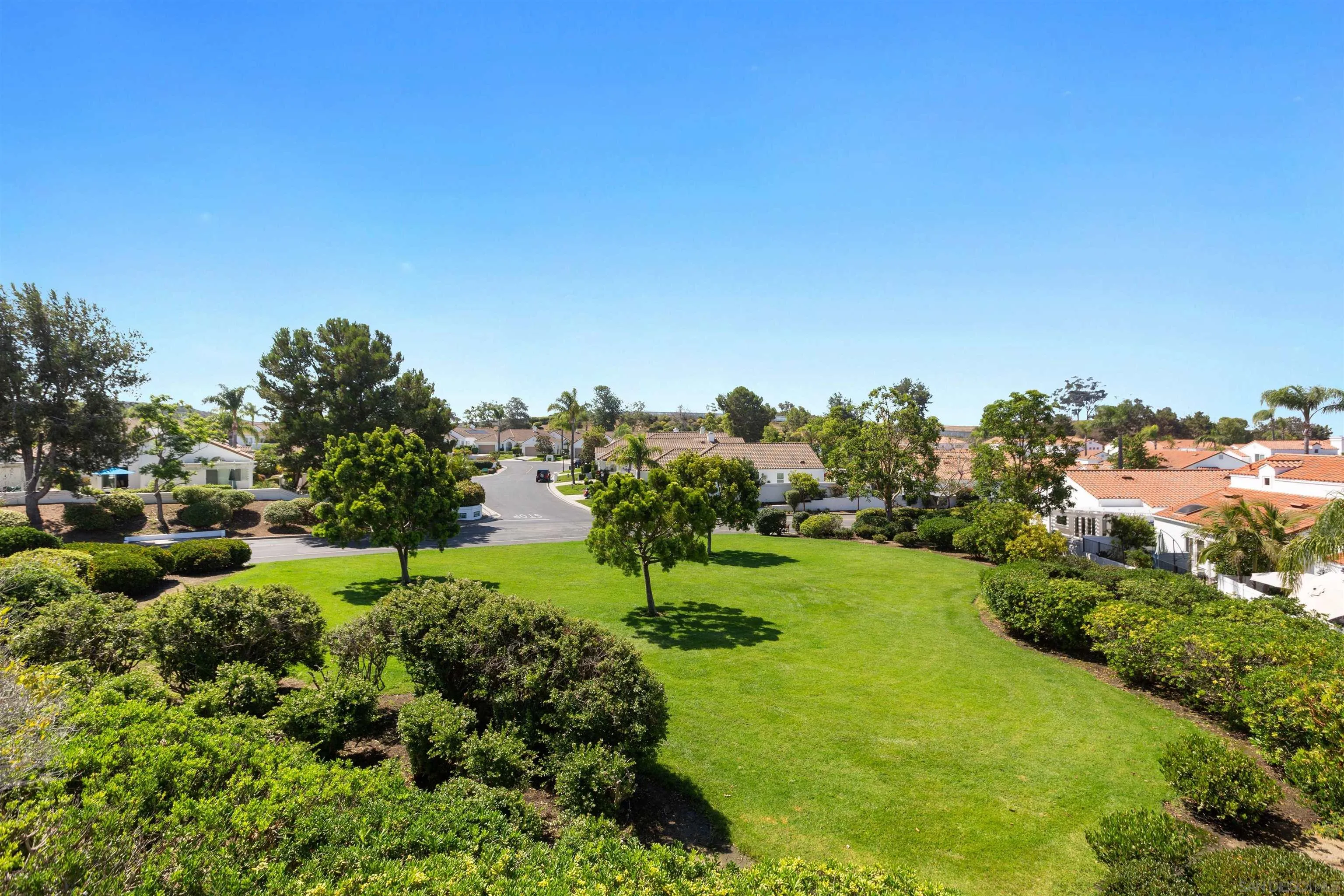 4963 Pylos Way Oceanside, CA 92056 - Photo 37 of 53 a view of a garden with a houses