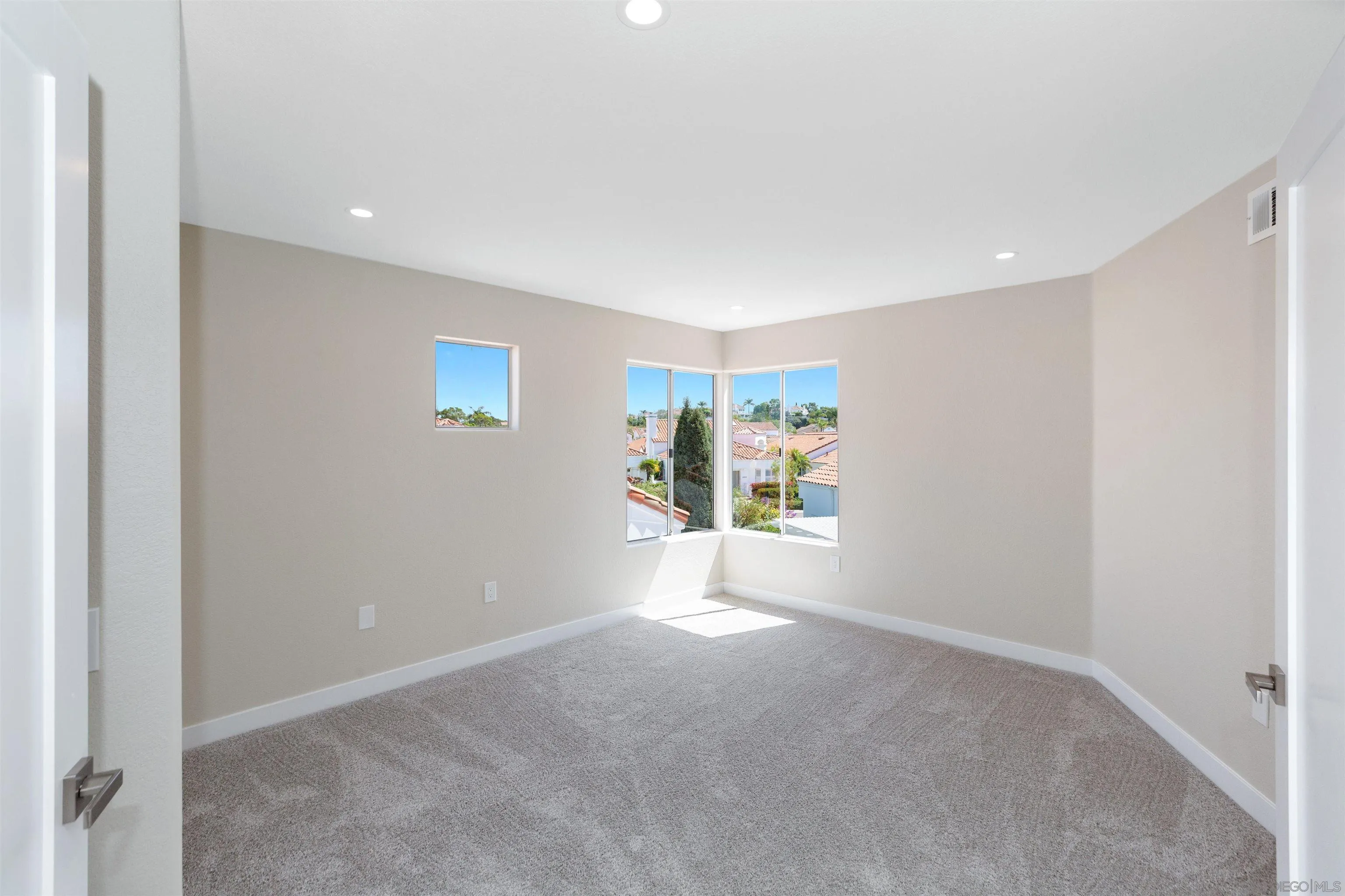 4963 Pylos Way Oceanside, CA 92056 - Photo 38 of 53 a view of an empty room with a window