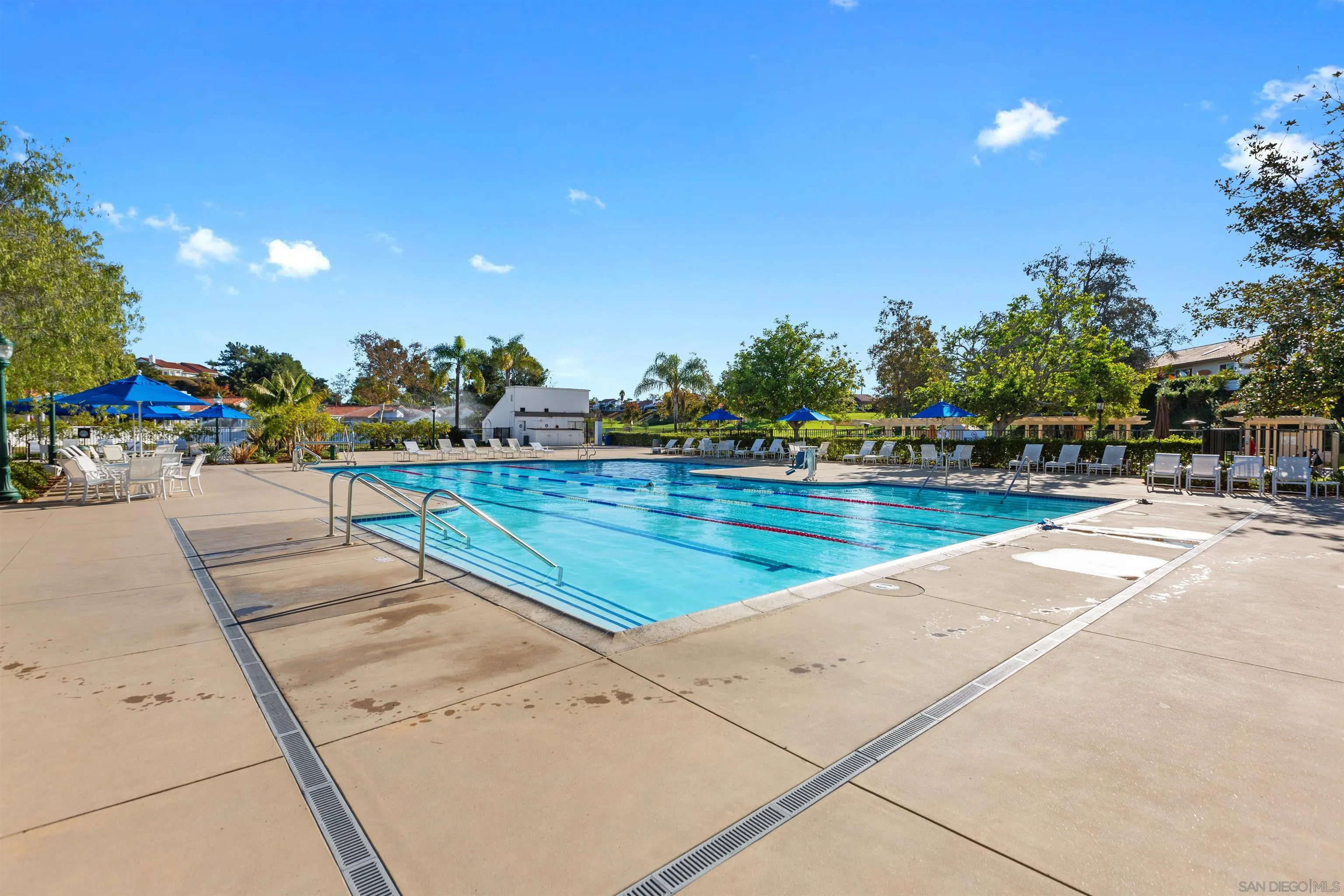 4963 Pylos Way Oceanside, CA 92056 - Photo 48 of 53 a view of swimming pool with outdoor seating and plants