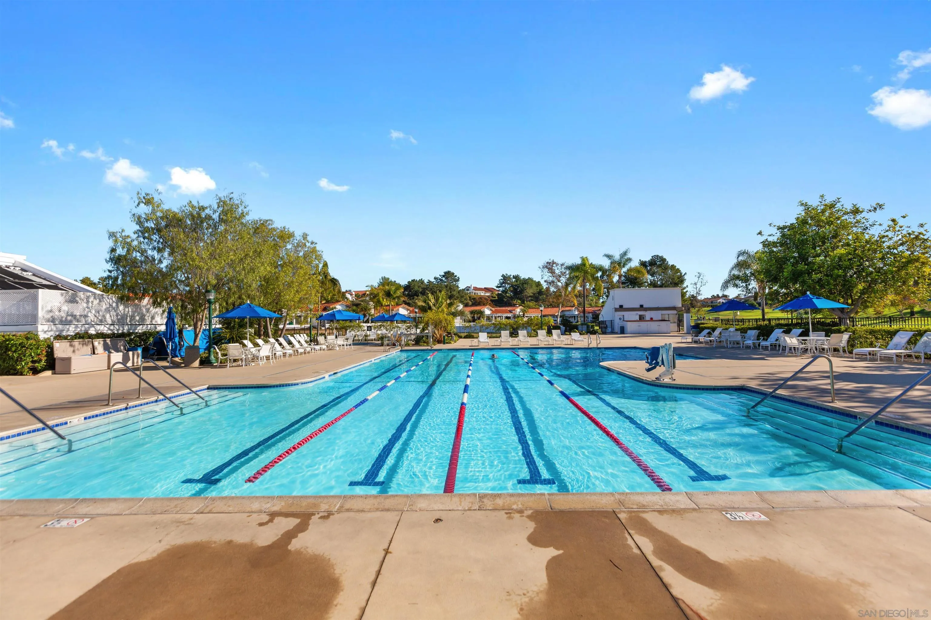 4963 Pylos Way Oceanside, CA 92056 - Photo 49 of 53 a view of a swimming pool with an outdoor seating and a yard