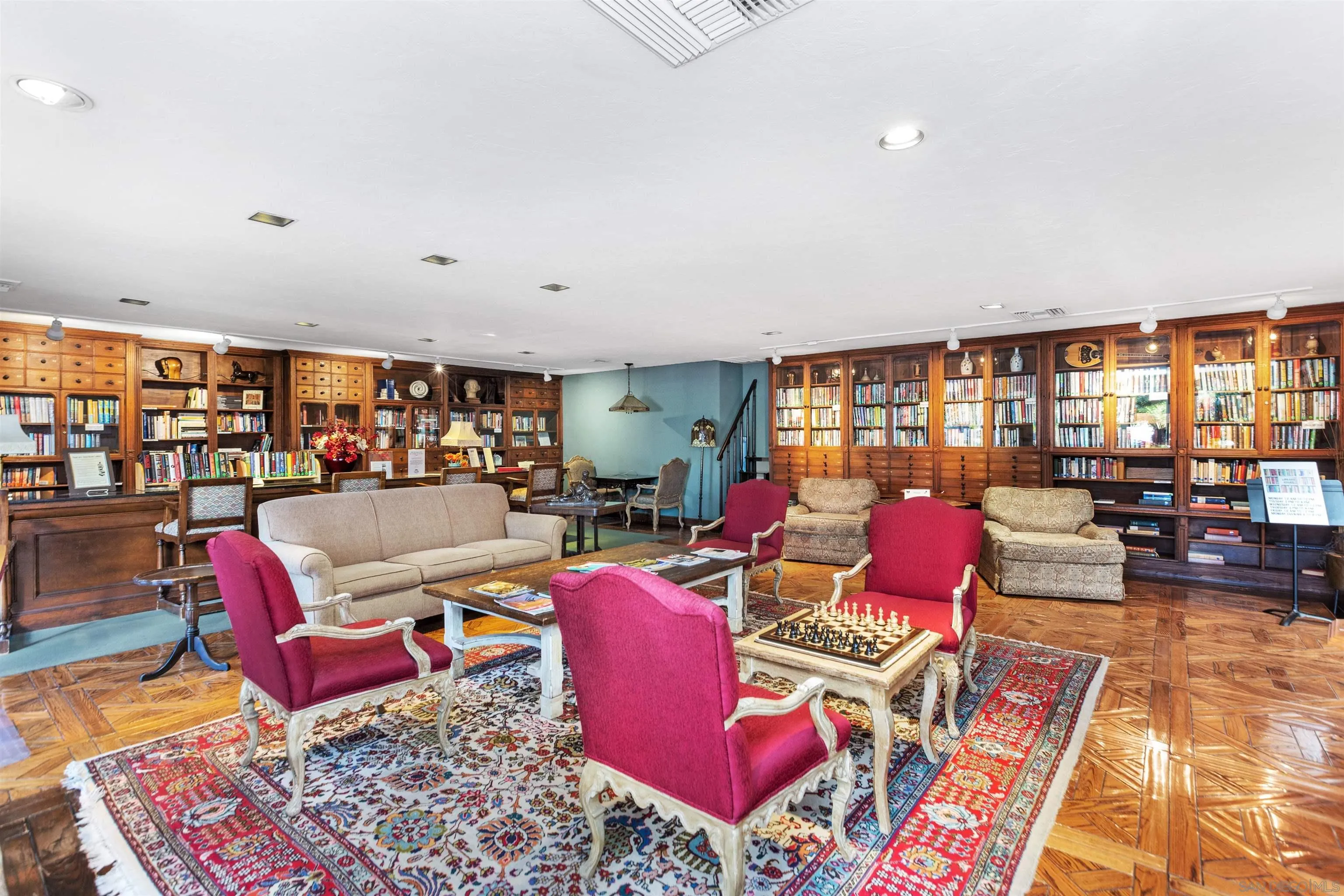 4963 Pylos Way Oceanside, CA 92056 - Photo 53 of 53 a living room with furniture and a rug