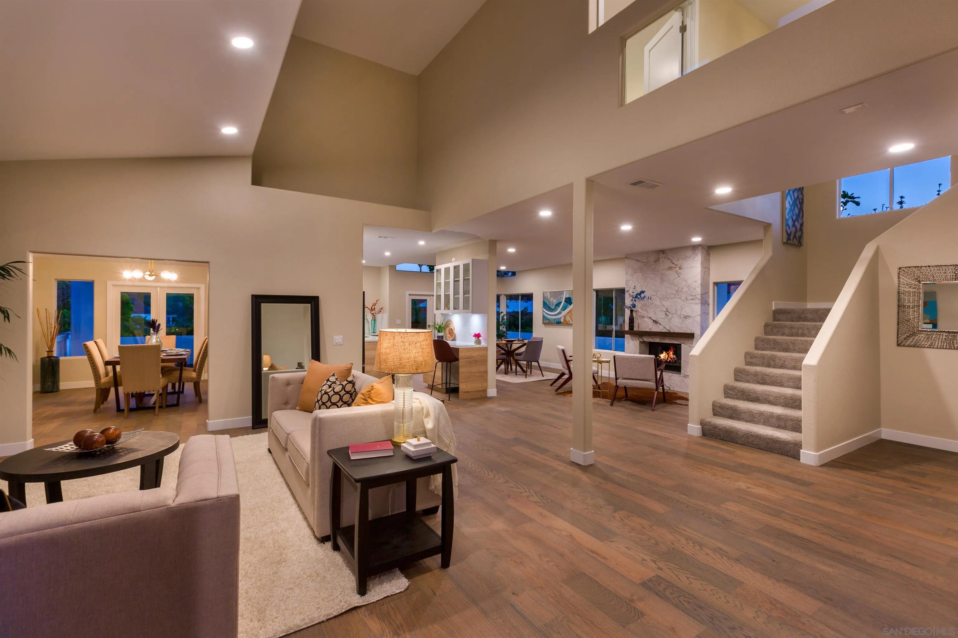 4963 Pylos Way Oceanside, CA 92056 - Photo 9 of 53 a living room with furniture and a wooden floor