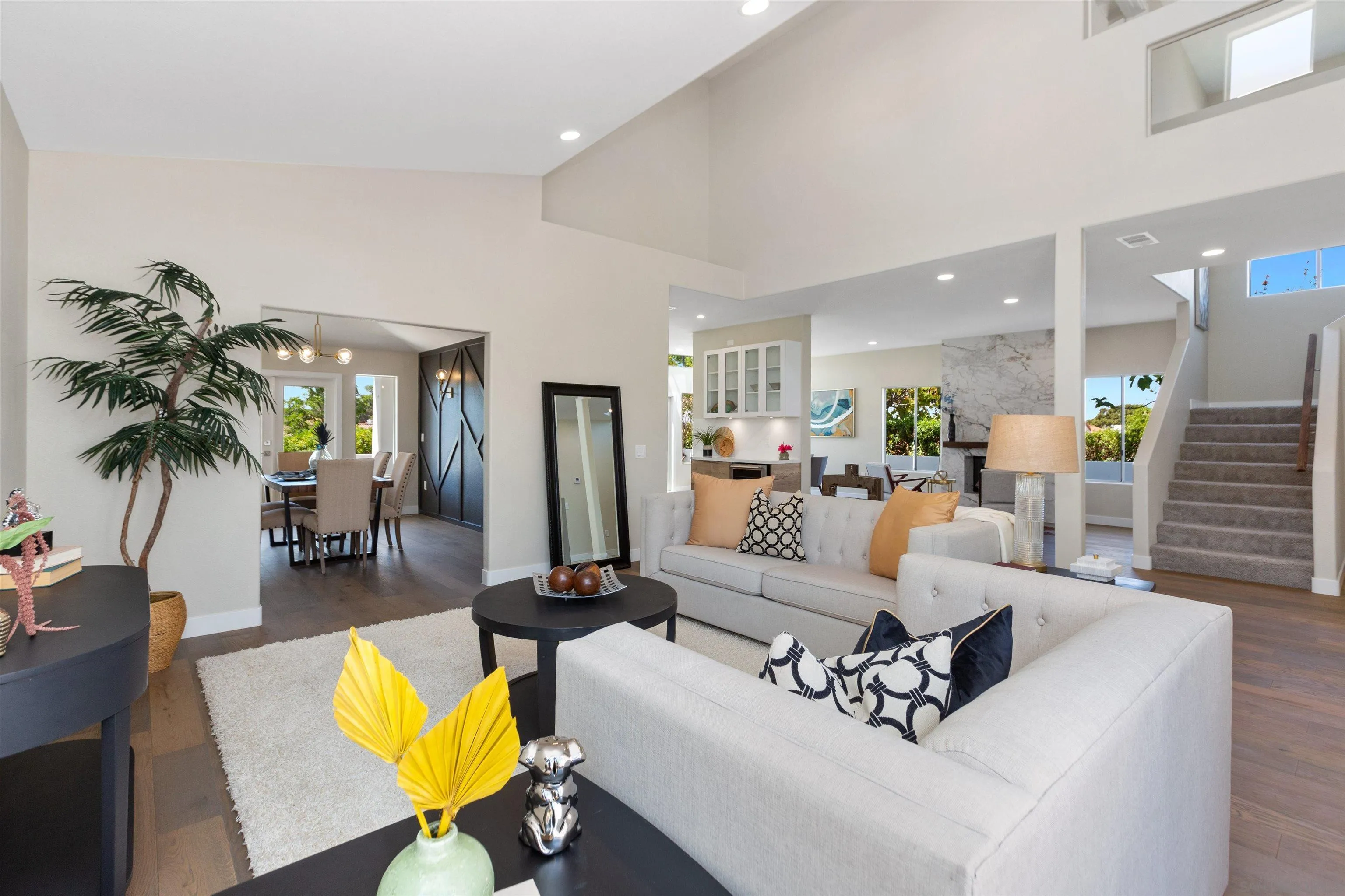 4963 Pylos Way Oceanside, CA 92056 - Photo 10 of 53 a living room with furniture kitchen view and a large window