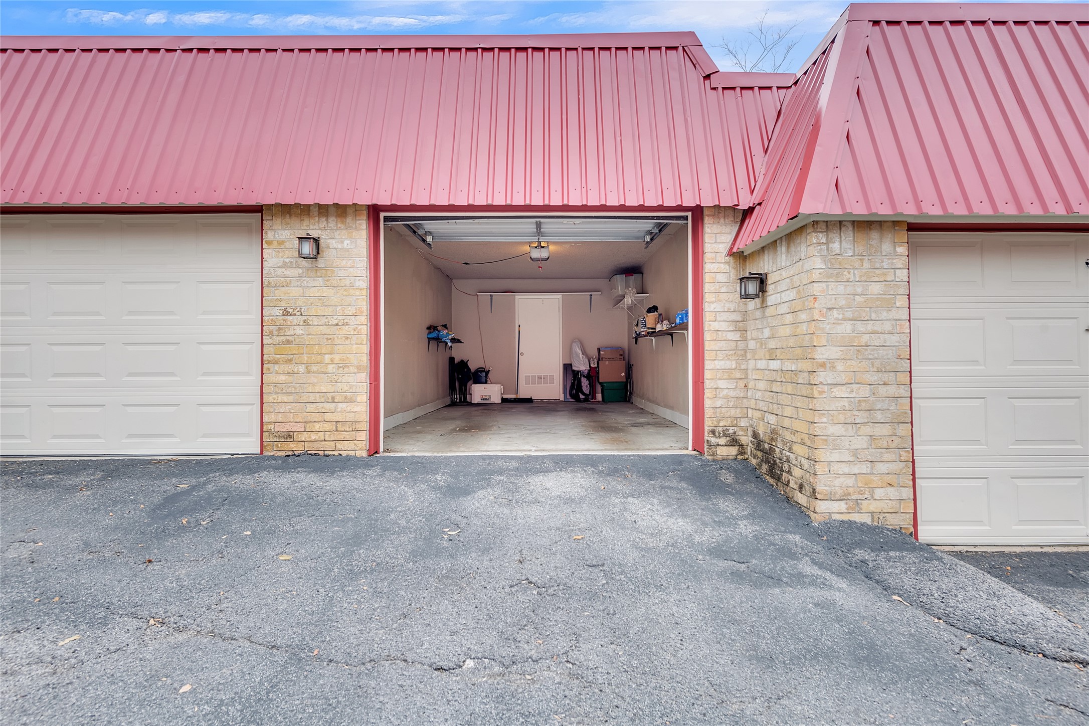 1201 Ranch Road 1431, Unit 8 Marble Falls, TX 78654 - Photo 23 of 24 One Car Garage with Electric Opener and Small Storage.