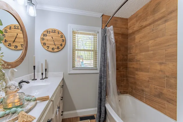 a view of house with outdoor space and windows