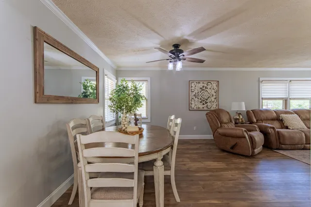 a view of a livingroom with furniture and window
