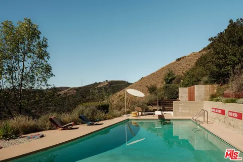 a view of a terrace with a garden