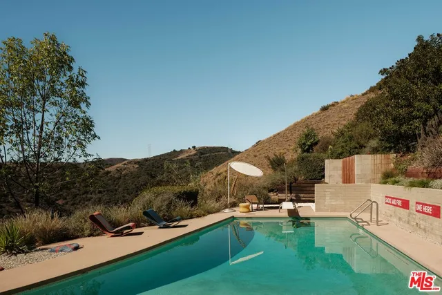 a view of a terrace with a garden