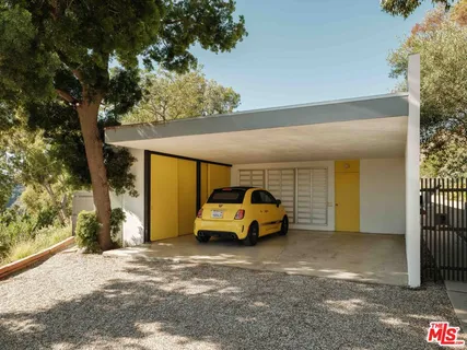 a car parked in front of a house