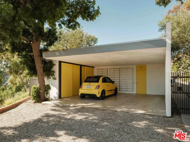 a car parked in front of a house