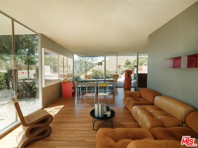 a outdoor living space with furniture and garden view