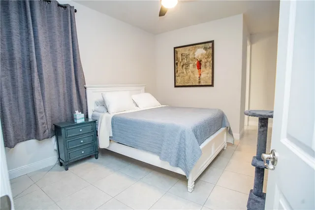 a view of a storage & utility room with a sink
