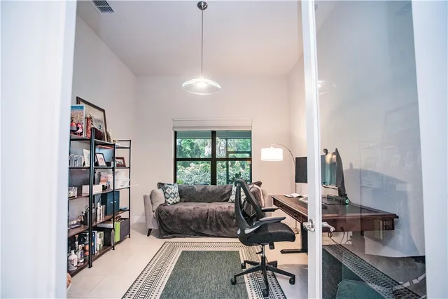 a bathroom with a toilet sink and shower