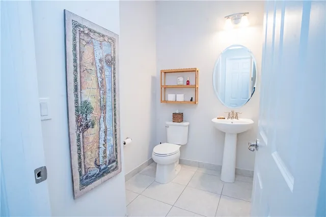 a spacious bedroom with a bed and a table in it