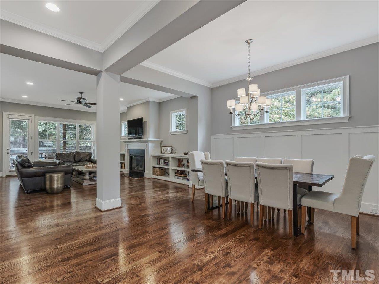 6427 Rosny Road Raleigh, NC 27613 - Photo 3 of 53 a view of a dining room with furniture window and wooden floor