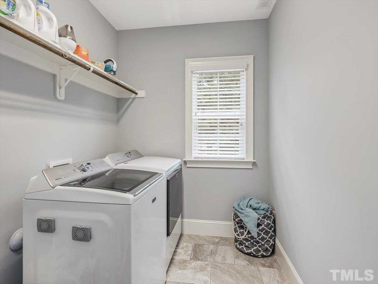 6427 Rosny Road Raleigh, NC 27613 - Photo 44 of 53 a utility room with dryer and washer