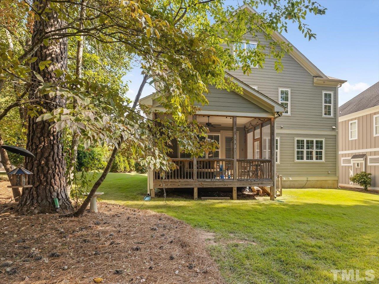 6427 Rosny Road Raleigh, NC 27613 - Photo 52 of 53 a front view of a house with garden