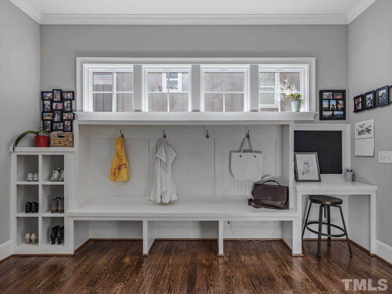 6427 Rosny Road Raleigh, NC 27613 - Photo 6 of 53 a view of dining room and wooden floor