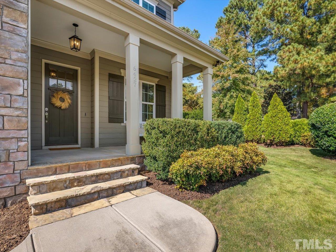 6427 Rosny Road Raleigh, NC 27613 - Photo 8 of 53 a view of a house with a backyard and porch