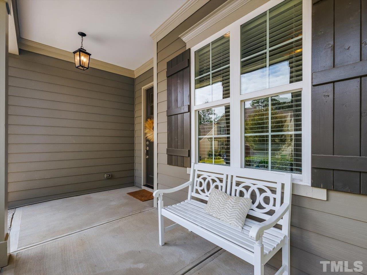 6427 Rosny Road Raleigh, NC 27613 - Photo 9 of 53 a view of a bench in front of building