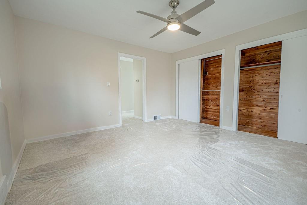 1435 Morrow Road Pittsburgh, PA 15241 - Photo 10 of 26 an empty room with closet and windows